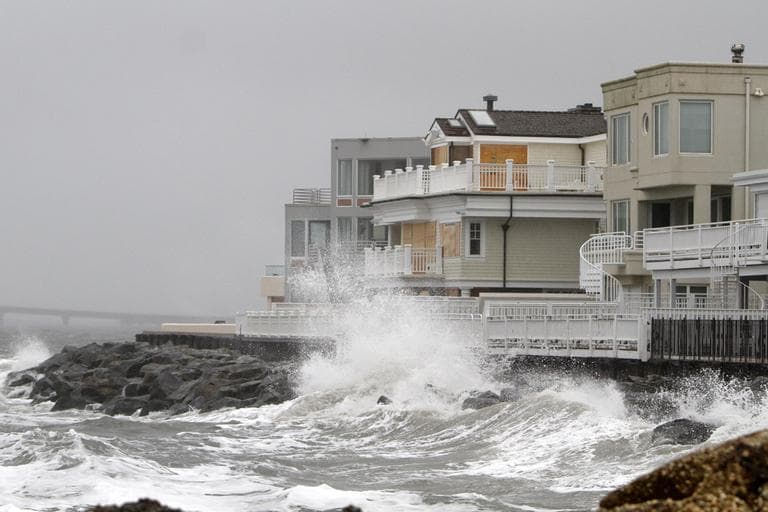 Waves crash onto the sea wall protecting homes in Longport, N.J., Sunday, Oct. 28, 2012, as Hurricane Sandy approaches the area. (AP)