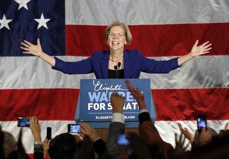 Democrat Elizabeth Warren takes the stage after defeating incumbent GOP Sen. Scott Brown in the Massachusetts Senate race on Tuesday. (Michael Dwyer/AP)