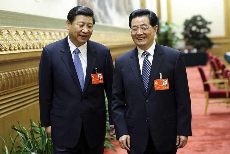 China's President Hu Jintao, right, walks with Vice-President Xi Jinping, after the opening of the Communist Party congress on Wednesday. Jinping is expected to be the next president. (China's Xinhua News Agency/AP)