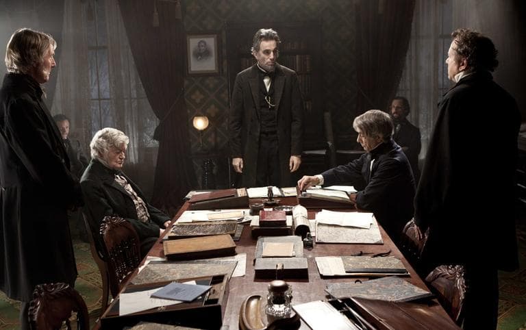 Daniel Day-Lewis, center, as Abraham Lincoln, in a scene from the film, &quot;Lincoln.&quot;  (DreamWorks, Twentieth Century Fox, David James, AP File)