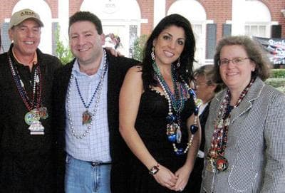 From left to right, David Petraeus, Scott and Jill Kelley, and Holly Petraeus watch the Gasparilla Parade in Tampa, Fla. in 2010. (Amu Scherzer/The Tampa Bay Times)