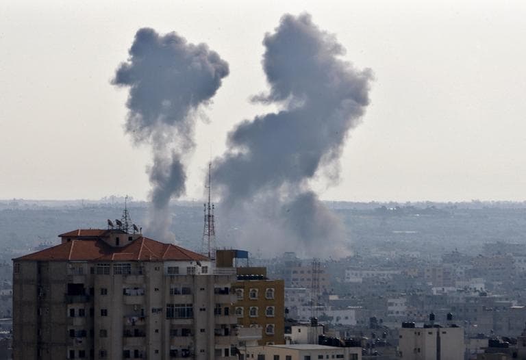 Smoke rises following an Israeli attack on Gaza City on Thursday. (Adel Hana/AP)