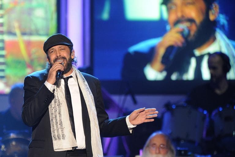 Juan Luis Guerra performs "Lindeza" at the 2012 Latin Recording Academy Person of the Year Tribute to Caetano Veloso at the MGM Grand Garden Arena on Wednesday in Las Vegas. (Powers Imagery/Invision/AP)
