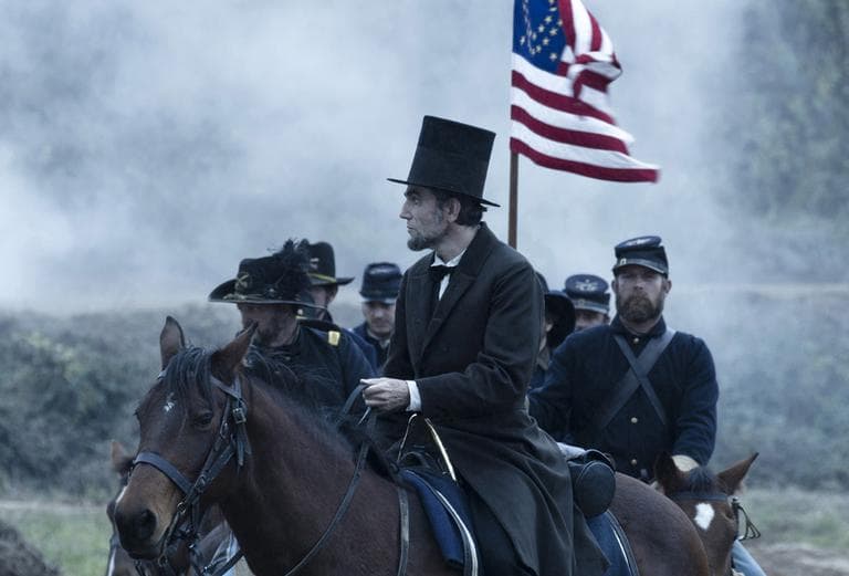 Daniel Day-Lewis, center, as President Abraham Lincoln in Steven Spielberg's drama "Lincoln." (Disney-DreamWorks II)