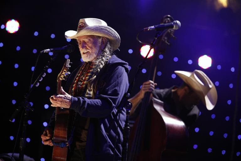Willie Nelson performs during the Farm Aid 2012 concert at Hersheypark Stadium in Hershey, Pa., Saturday, Sept. 22, 2012. (Jacqueline Larma/AP)