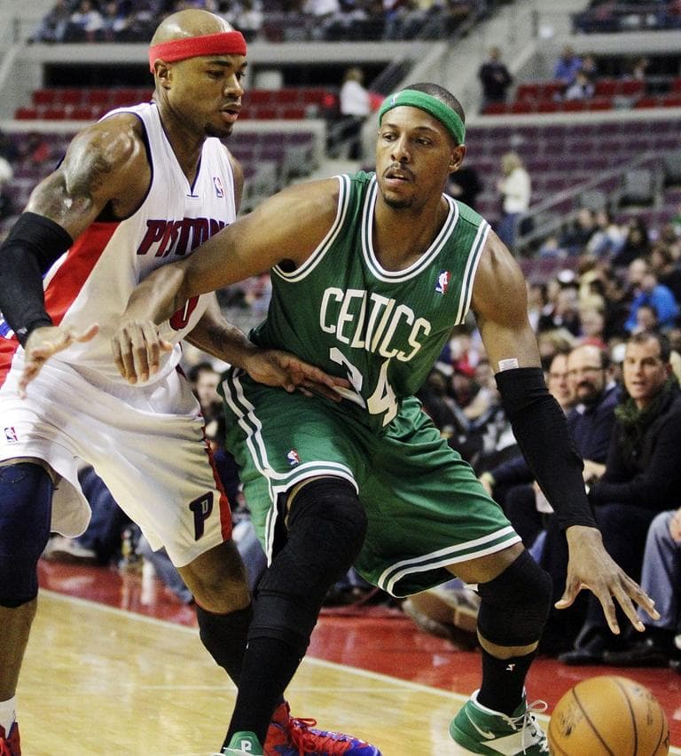 Boston Celtics forward Paul Pierce, right, drives against Detroit Pistons forward Corey Maggette (50). (AP/Duane Burleson)