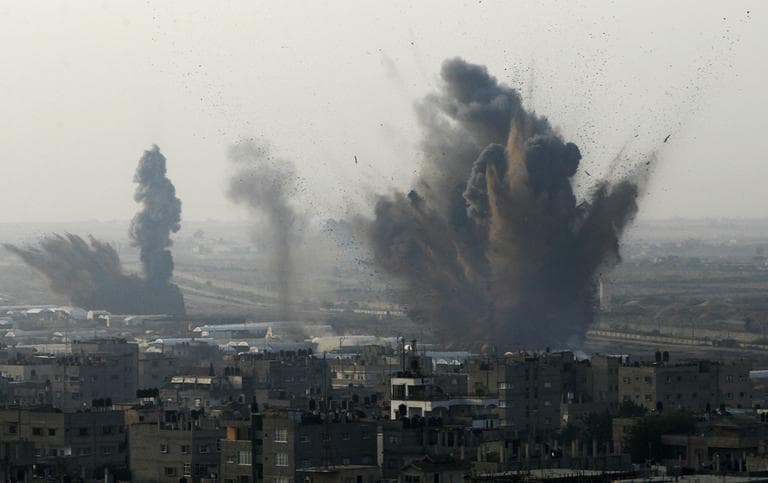 Smoke rises following an Israeli attack on smuggling tunnels on the border between Egypt and Rafah, southern Gaza Strip, on Monday. (Eyad Baba/AP)