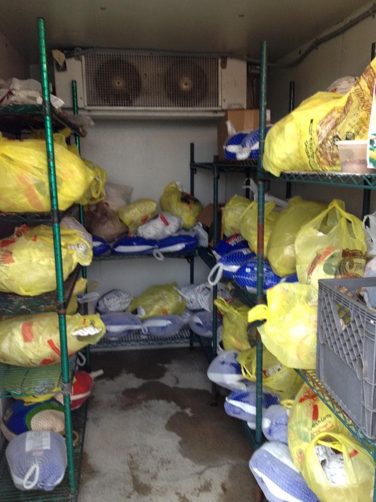The walk-in ice box at Mud City Crab House in Manahawkin, N.J. was full of donated turkeys. (Chris Ballman/Here & Now)