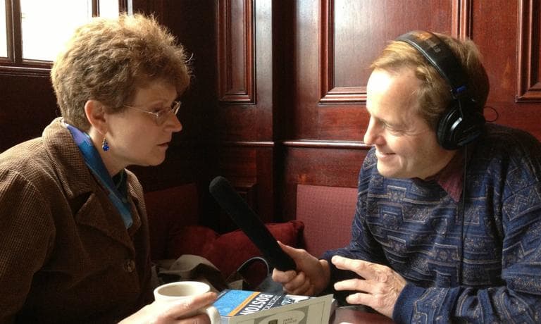 Stephanie Schorow being interviewed by Radio Boston co-host Anthony Brooks at J.J. Foley's in Boston's South End. (Dina Rosendorff/WBUR)