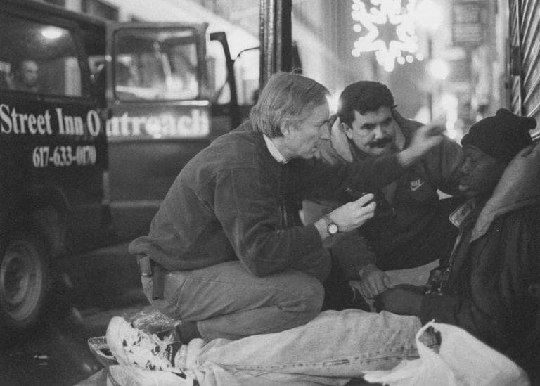 Outside the Pine Street Inn van, Dr. Jim O’Connell treats a patient. (Courtesy)