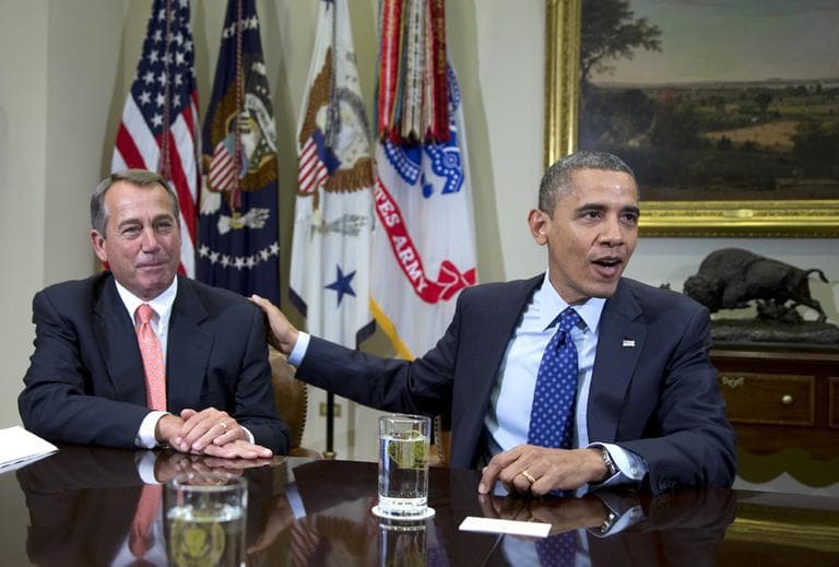 In this Nov. 16, 2012, photo, President Obama acknowledges House Speaker John Boehner of Ohio while speaking to reporters, as he hosted a meeting of the leadership of Congress to discuss the deficit and economy. (Carolyn Kaster/AP)