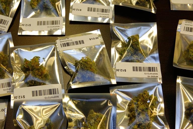 In this Nov. 7 file photo, medical marijuana is packaged for sale in a dispensary in Seattle. Massachusetts voters approved of medical marijuana on Election Day.  (Ted S. Warren/AP, File)
