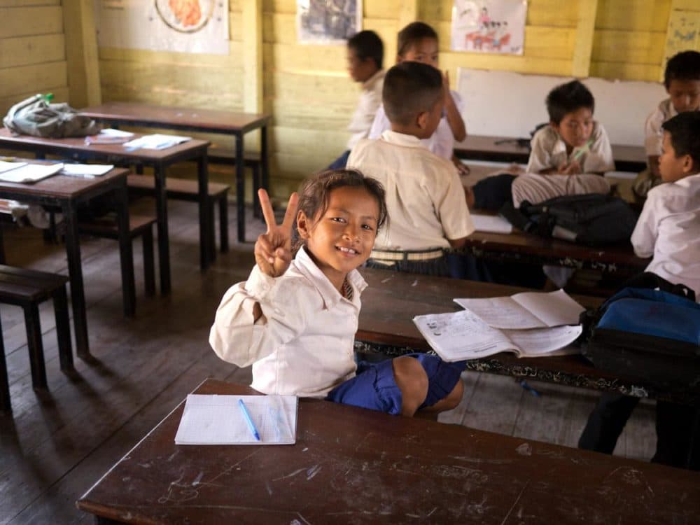 Cambodian school and student (Russ Wilcox)