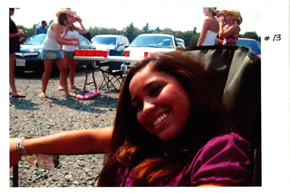 In this evidence exhibit photo, Nina Houlihan is at the music festival in 2008. A beer pong game goes on in the background. (Courtesy)