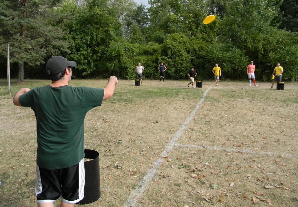 A KanJam player anticipates his partner’s throw during early rounds of the tournament. Deflecting the disc into the “kan” is worth three points. (Daniel Robison/OAG)