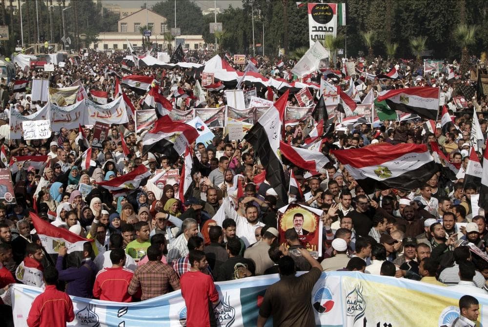 Supporters of Egyptian President Mohammed Morsi attend a rally in front of Cairo University in Cairo, Egypt, Saturday, Dec. 1, 2012. (Thomas Hartwell/AP)