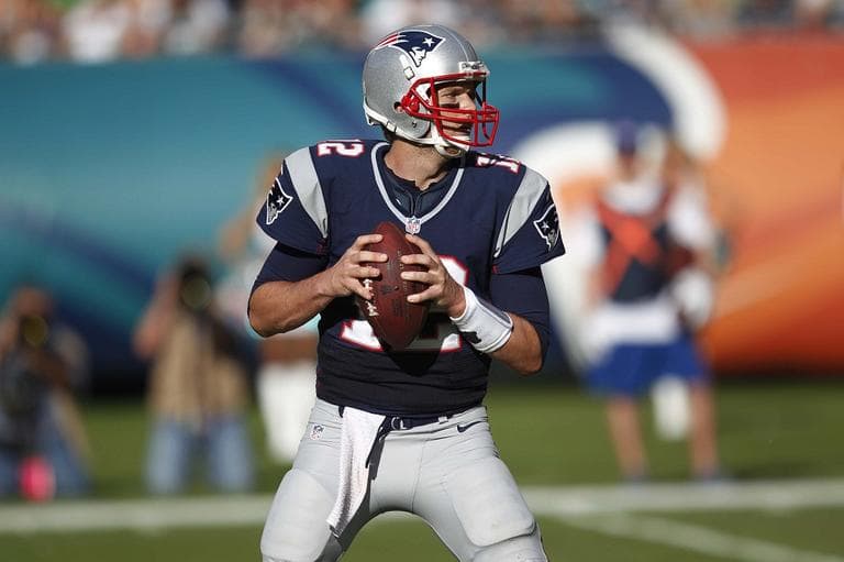 Quarterback Tom Brady looks to pass on Sunday, Dec. 2, 2012, in Miami . (AP/Wilfredo Lee)
