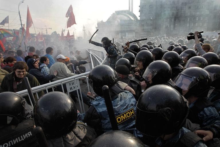 Russian riot police disperse opposition protesters in downtown Moscow, May 6, 2012. Riot police in began arresting protesters who were trying to reach the Kremlin in a demonstration on the eve of Vladimir Putin's inauguration as president. (AP Photo/Sergey Ponomarev, File)
