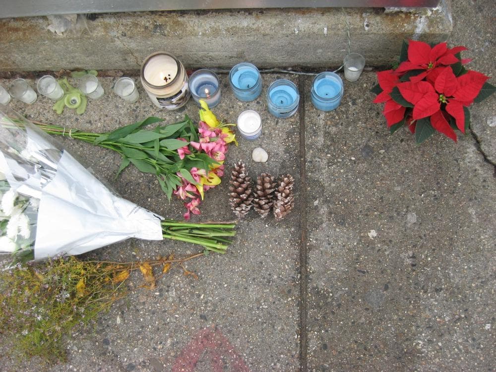 A makeshift memorial has been set up on the corner of Commonwealth Avenue and St. Paul Street in Boston. (Chris Ballman/WBUR)