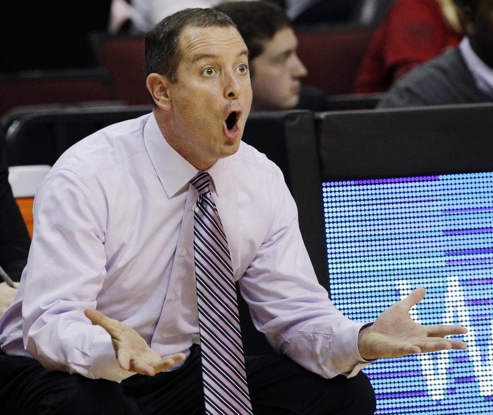 On Thursday, Rutgers suspended basketball head coach Mike Rice for three games without pay and fined him $50,000 for violating department policy. (Mel Evans/AP)