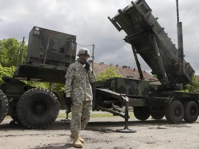 In this May 26, 2010 file photo, a U.S. soldier stands next to a Patriot surface-to-air missile battery at an army base in Morag, Poland. (AP/Czarek Sokolowski, File)