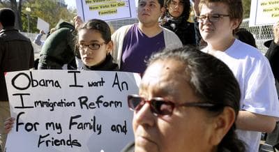 Diana Saravia, 10, of Beltsville, Md., left, demonstrates &mdash; along with members of immigration rights organizations &mdash; in front of the White House as they call on President Barack Obama to fulfill his promise of passing comprehensive immigration reform, in Washington, Thursday, Nov. 8, 2012. (Cliff Owen/AP)