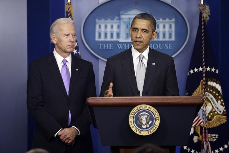 President Obama stands with Vice President Joe Biden as he makes a statement on Wednesday in the Brady Press Briefing Room at the White House in Washington, about policies he will pursue following the massacre at Sandy Hook Elementary School in Newtown, Conn. Obama is tasking Biden, a longtime gun control advocate, with spearheading the effort. (Charles Dharapak/AP)