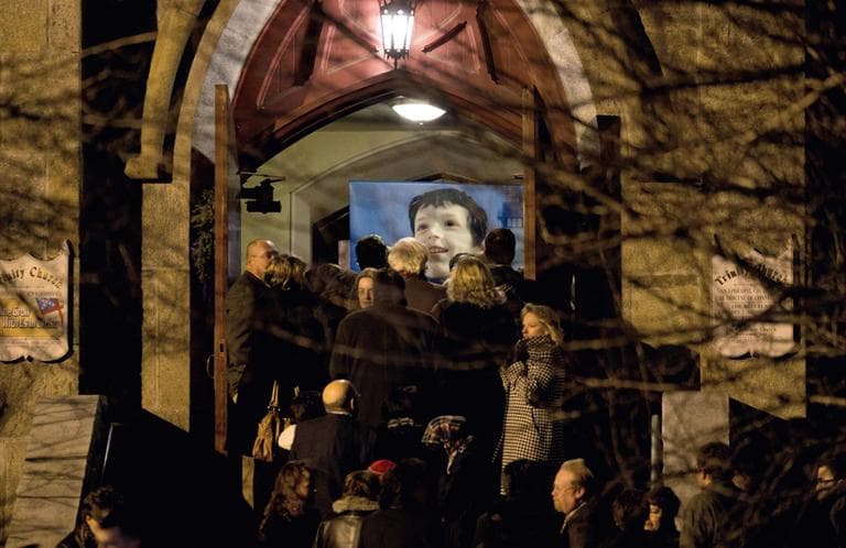 An image of 6-year-old Sandy Hook Elementary School shooting victim Benjamin Andrew Wheeler is displayed at the entrance to Trinity Episcopal Church as mourners file in for his wake, Wednesday, Dec. 19, 2012, in Newtown, Conn. (AP)