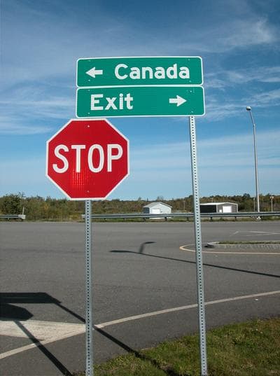 A sign outside U.S. Customs in Calais, Maine. (Steve Brown/WBUR)