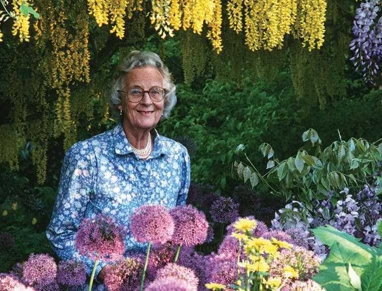 English garden designer Rosemary Verey is pictured in the famous garden at Barnsley House, which she designed.