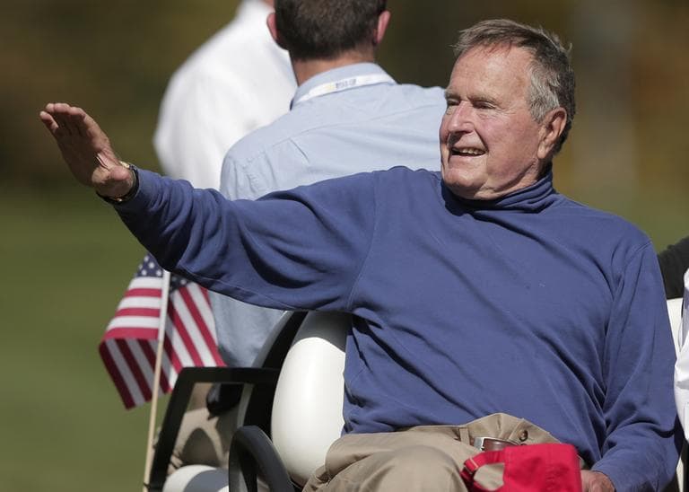 In this Sept. 29, 2012 photo, Former President George H. W. Bush waves to the crowd at the Ryder Cup PGA golf tournament in Medinah, Ill. (Charlie Riedel/AP)