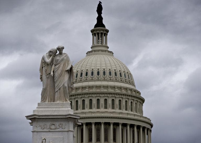 Gray skies cover the U.S. Capitol in Washington on Friday, Dec. 21, 2012. (J. Scott Applewhite/AP)