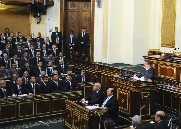 In this image released by the Egyptian Presidency, Mohammed Morsi addresses the newly convened upper house of parliament in Cairo, Egypt, Saturday, Dec. 29, 2012.  (Egyptian Presidency/AP)
