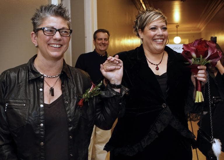 Donna Galluzzo, left, and Lisa Gorney leave the City Clerk&#039;s office after obtaining their marriage license, early Saturday, Dec. 29, 2012, at City Hall in Portland, Maine. (Robert F. Bukaty/AP)