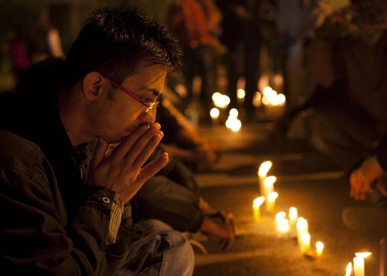 An Indian participates in a candlelight vigil to mourn the death of a gang rape victim in New Delhi, India, Saturday, Dec. 29, 2012. (Dar Yasin/AP)