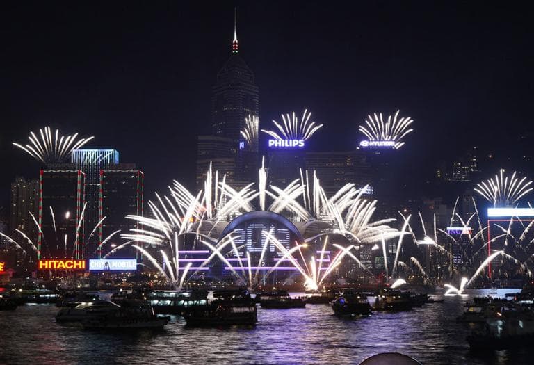 As fireworks ring in the New Year in Hong Kong, what are some bright spots from 2012? (AP/Kin Cheung)