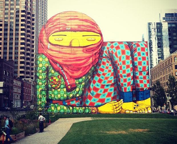 The Os Gemeos mural in Dewey Square Park outside Boston's South Station. (via Instagram, Abby Elizabeth Conway/WBUR)