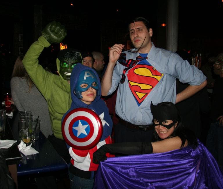 Dan Cooper at the Hulk, Kevin Pacheco as Clark Kent, and Melina Mon as Batgirl. (Photo courtesy of Bella Luna Restaurant and the Milky Way Lounge)