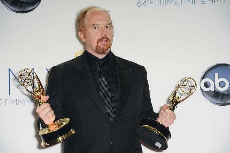 Louis C.K. poses for a photo at the Emmy Awards, September 23, 2012. (Katy Winn/AP)