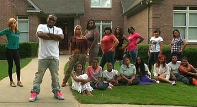 Rapper Shawty Lo is pictured with his 11 children and their 10 mothers in a short video promoting the planned Oxygen TV show &quot;All My Babies' Mamas.&quot; (screenshot)
