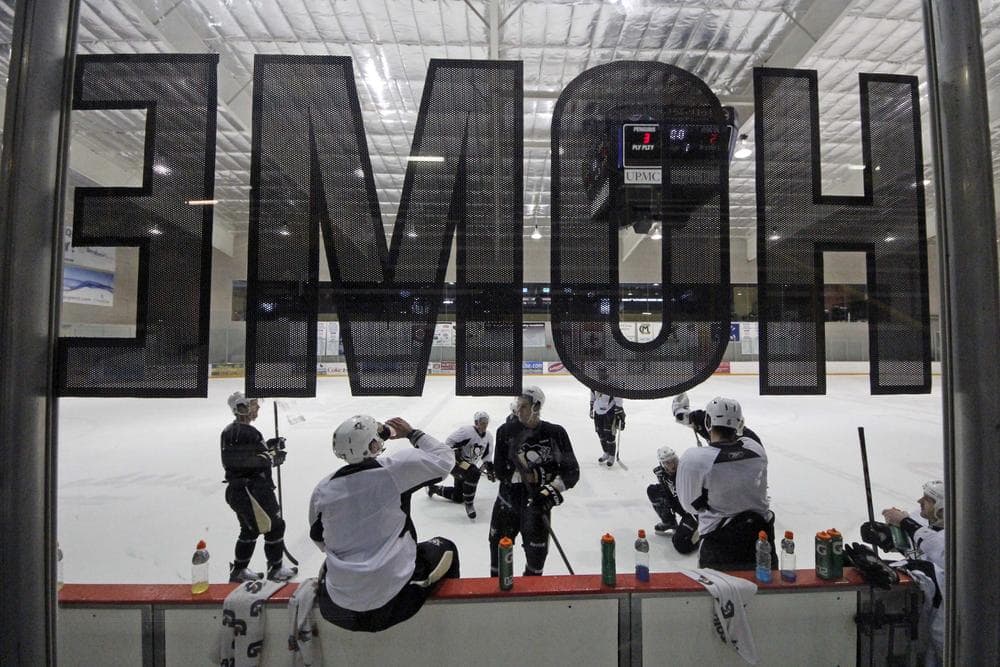 Players from the Pittsburgh Penguins held an informal practice Monday after the NHL and the players' association announced a tentative agreement to end the lockout. (Gene Puskar/AP)