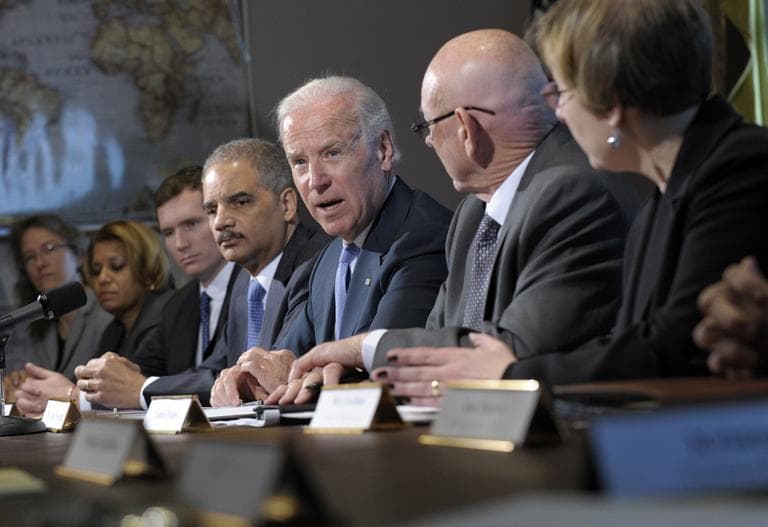 Vice President Joe Biden, with Attorney General Eric Holder at left, speaks during a meeting with victims&#039; groups and gun safety organizations in the Eisenhower Executive Office Building on the White House complex in Washington, on Wednesday. (Susan Walsh/AP)