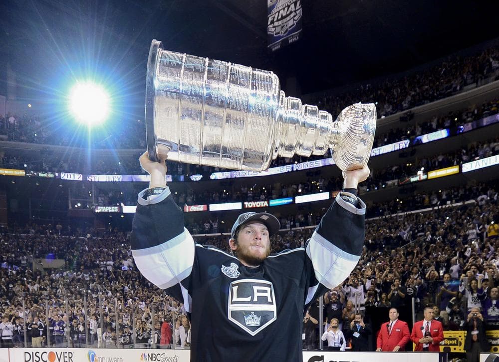 Goalie Jonathan Quick and the L.A. Kings haven't been able to defend their Stanley Cup victory due to this season's NHL lockout. (Mark J. Terrill/AP)