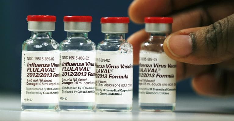 Vials of flu vaccine at the Whittier Street Health Center in Boston. Boston declared a public health emergency Wednesday (Charles Krupa/AP)