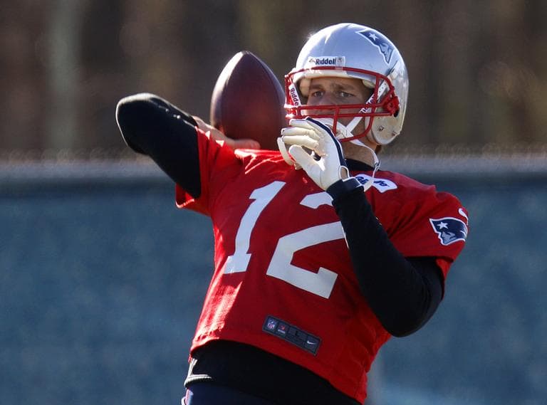 Quarterback Tom Brady throws a pass during practice at the team's facility in Foxborough on Thursday. The Pats host the Houston Texans in an AFC divisional playoff game on Sunday. (Stephan Savoia/AP)