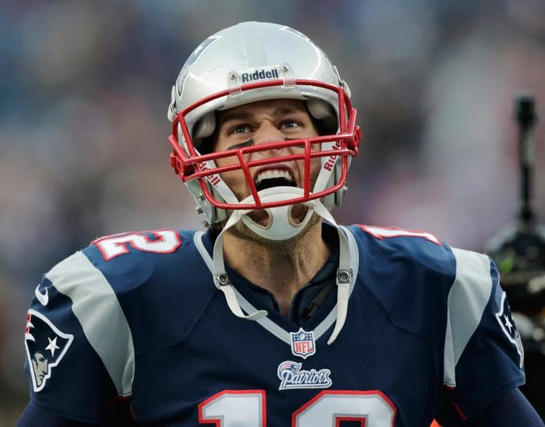 New England Patriots quarterback Tom Brady yells as he runs onto the field before an AFC divisional playoff NFL football game against the Houston Texans in Foxborough on Sunday. (Charles Krupa/AP)