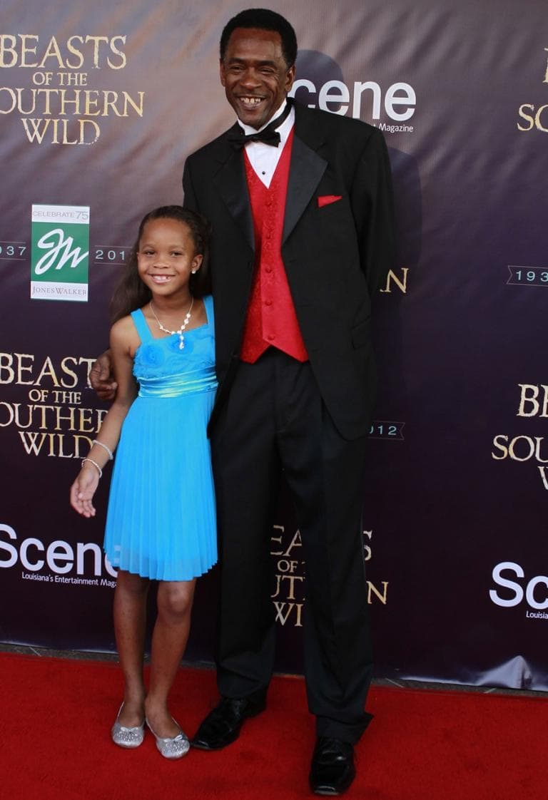 Actress Quvenzhané Wallis and actor Dwight Henry pose for photos on the red carpet at the premiere of the movie in New Orleans in June. (Gerald Herbert/AP)