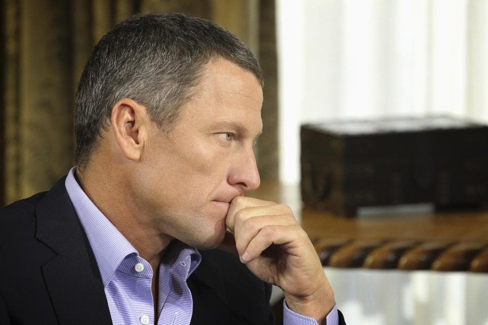 Lance Armstrong listens during his interview with talk show host Oprah Winfrey. (AP Photo/Courtesy of Harpo Studios, Inc)