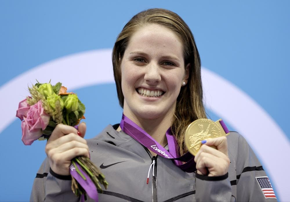 After winning four gold medals at the 2012 Olympics, 17-year-old swimmer Missy Franklin is competing for her high school's swim team (Michael Sohn/AP)