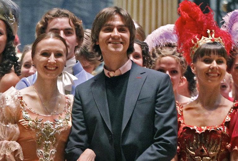 Sergei Filin, center, poses with members of the Bolshoi Theater company in September 2011. (Mikhail Metzel/AP)